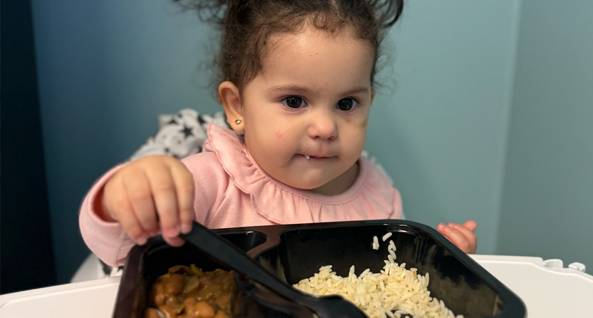 Child Care Meal being eaten by child at daycare center