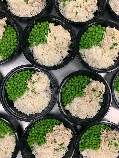 senior center meal with chicken rice and peas