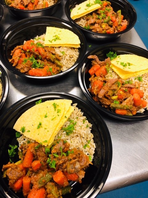 delicious, fresh and health bowl of food after prep, before being sent to a local food program that is partnering with Stock Pot Malden